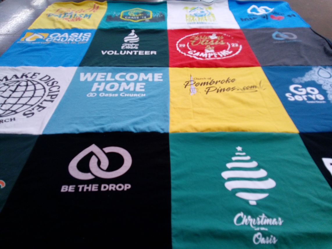 T-shirt quilt with community service, volunteering themes by Tonia from FL