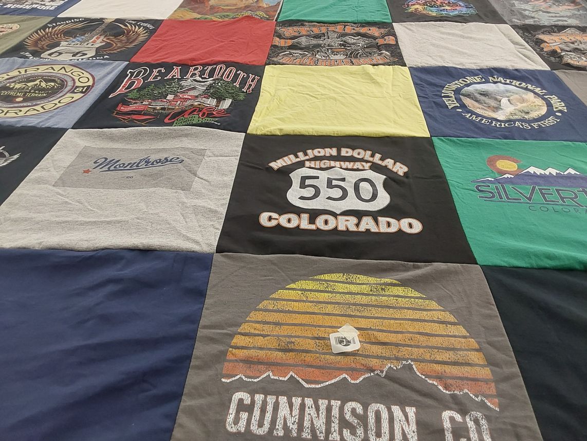 T-shirt quilt with travel, outdoor themes by james from TX