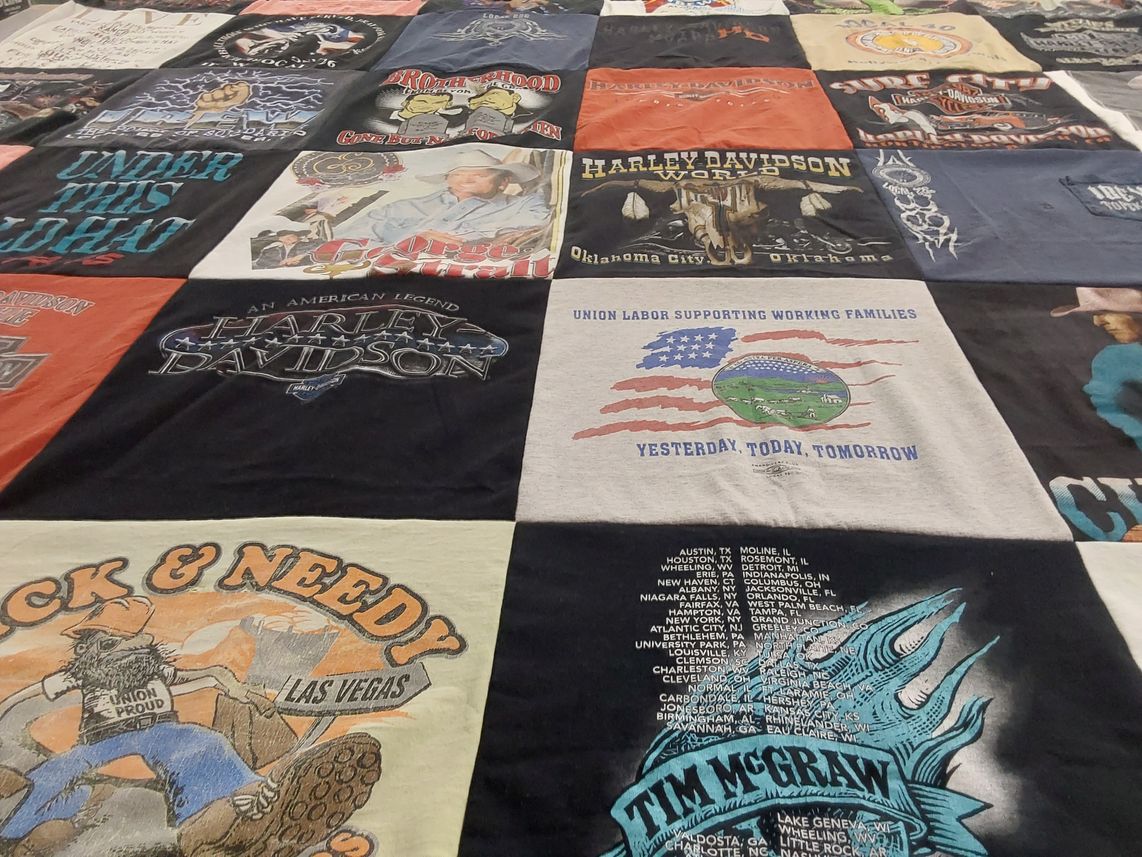 T-shirt quilt with motorcycles, music themes by Pat from KS