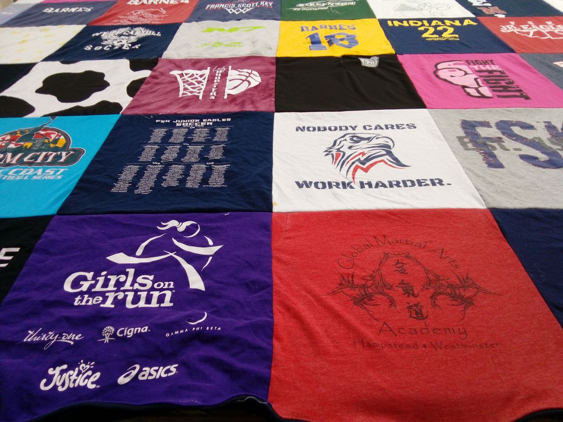 T-shirt quilt with sports, martial arts themes by Karen from MD