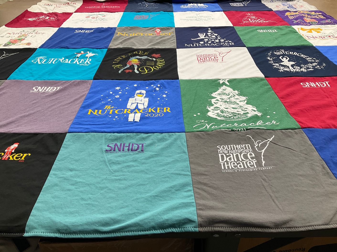 T-shirt quilt with dance, theater themes by Erika from NH