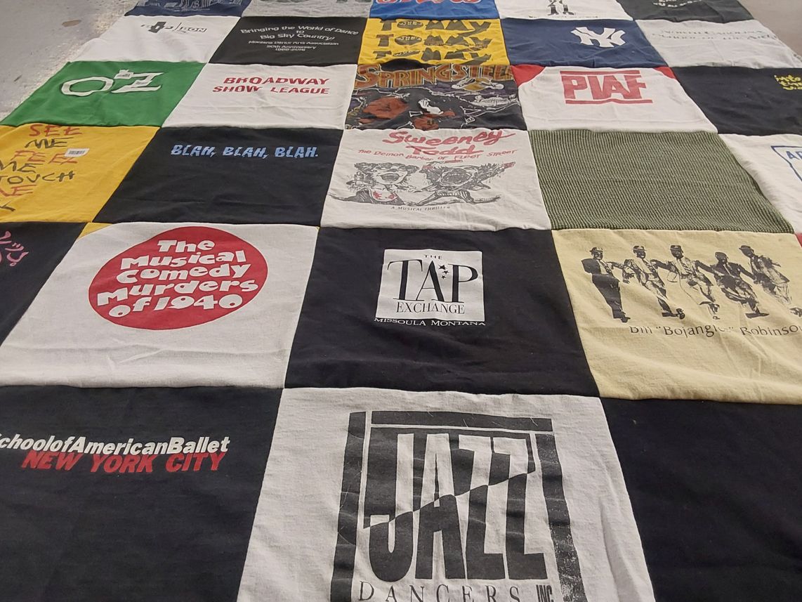 T-shirt quilt with theater, dance themes by Linda from MT