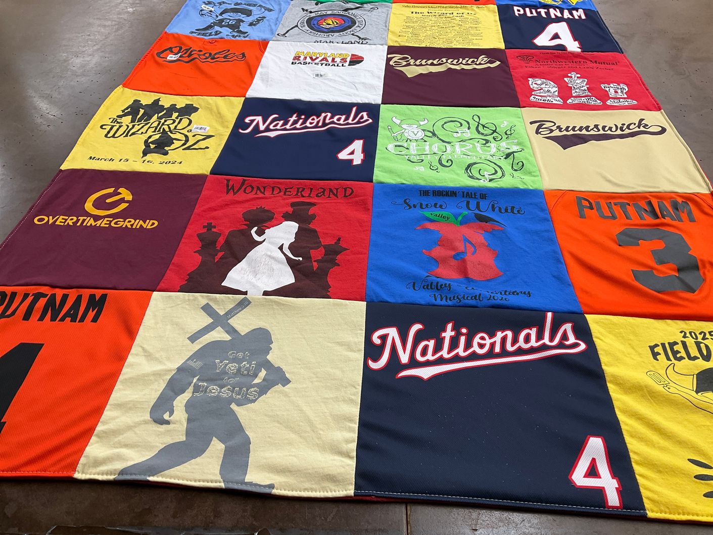 T-shirt quilt with theater, sports themes by Ashley from MD
