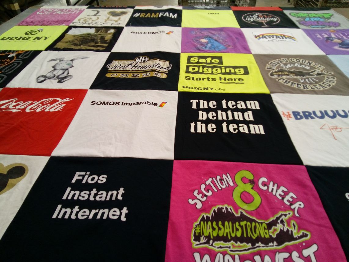 T-shirt quilt with cheerleading themes by Gael M from NY