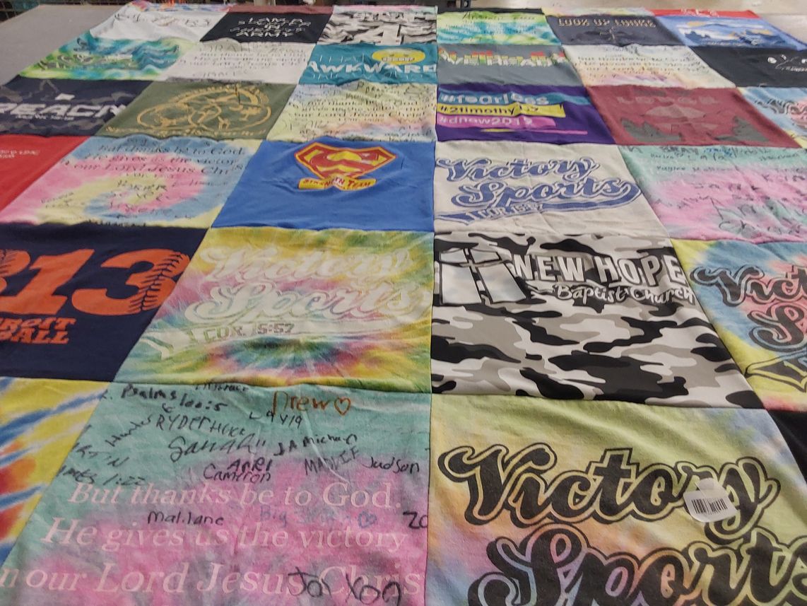 T-shirt quilt with sports, religion themes by Kelly from SC