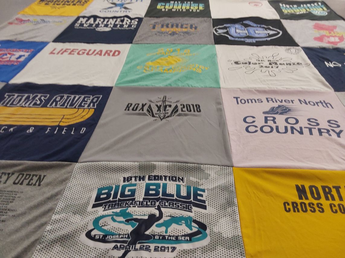 T-shirt quilt featuring toms river high school north cross country, toms river track and field team by James from NJ