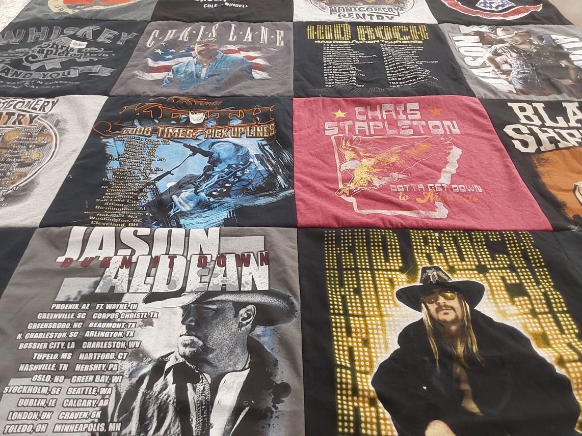 T-shirt quilt with country music, concerts themes by Regina from MI