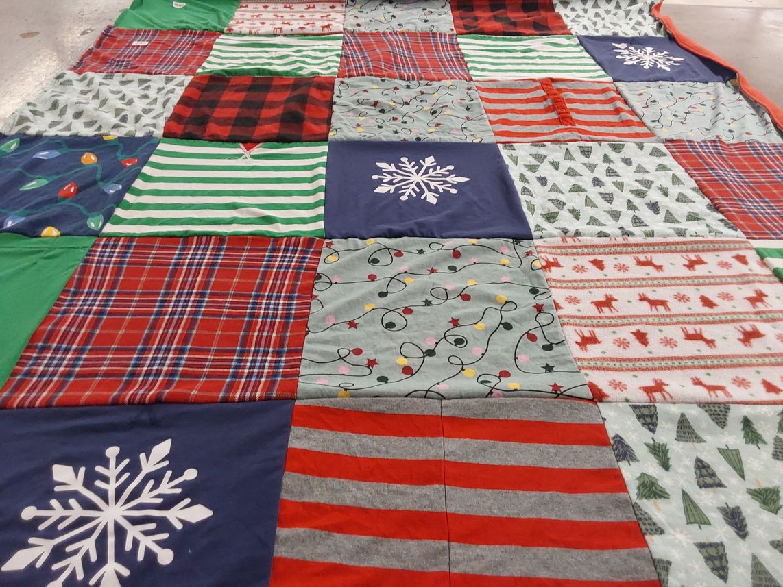 T-shirt quilt with christmas, holiday themes by Paula from MN