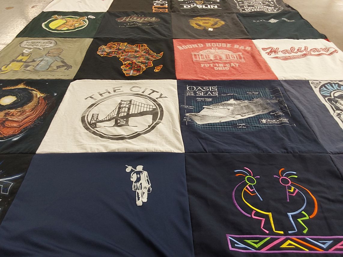 T-shirt quilt with travel, food themes by Tammy from FL