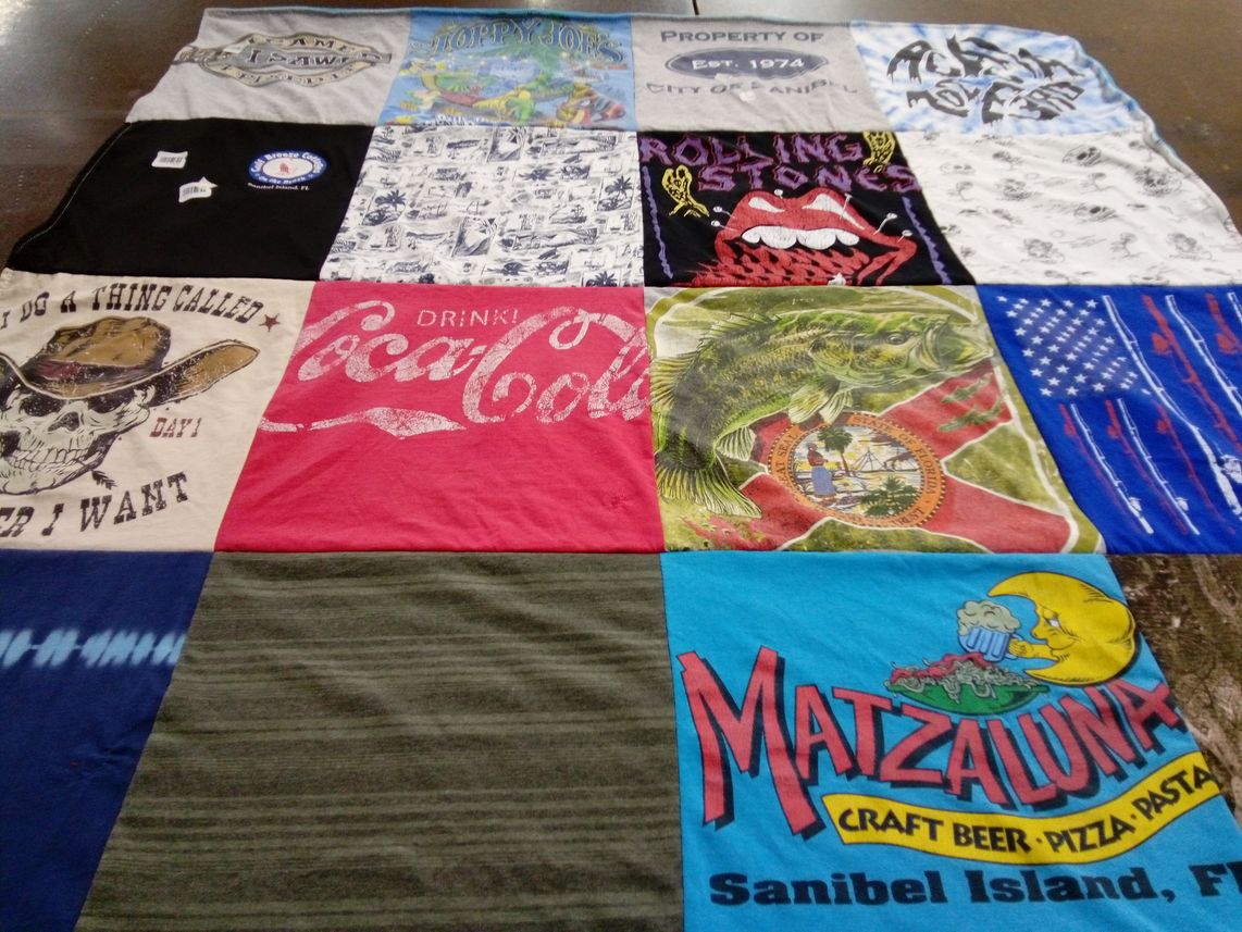 T-shirt quilt with fishing, craft beer themes by Lynne from FL