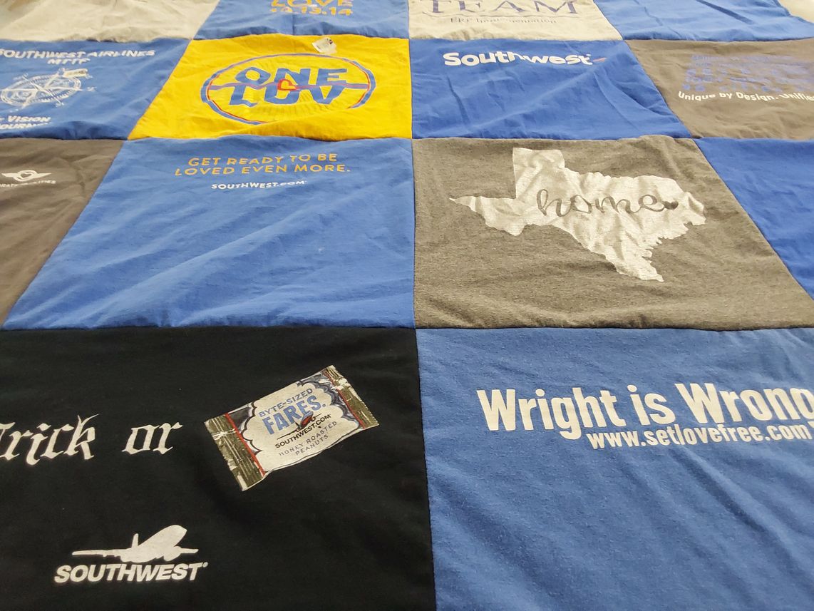 T-shirt quilt with aviation, travel themes by Felest from TX
