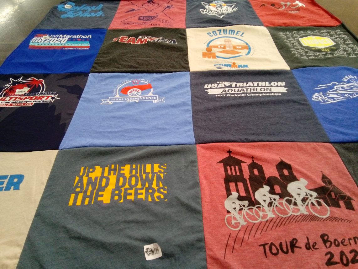 T-shirt quilt with triathlon, marathon themes by Nancy from TX