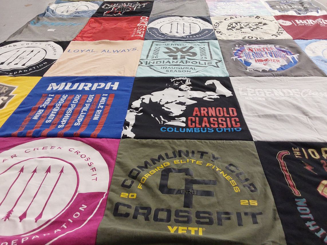 T-shirt quilt with fitness, exercise themes by Kristin from IN