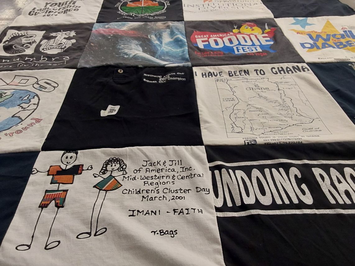 T-shirt quilt with cultural awareness, food festivals themes by CASSIE from MN