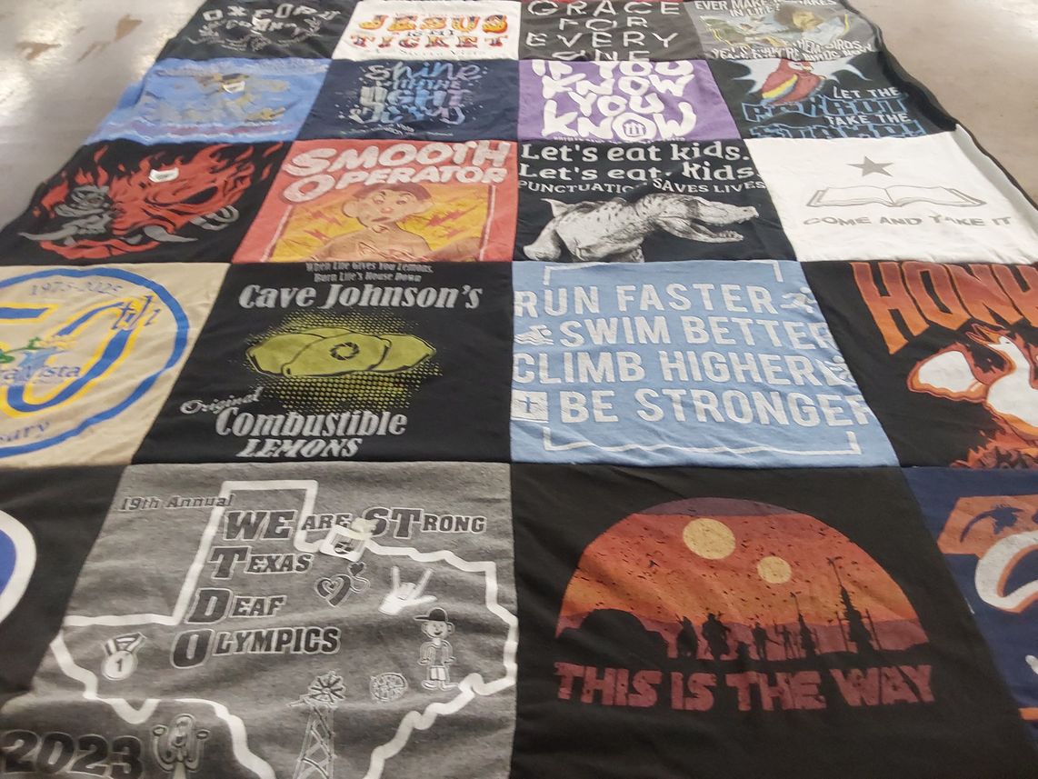 T-shirt quilt with comedy, sports themes by Kelly from TX