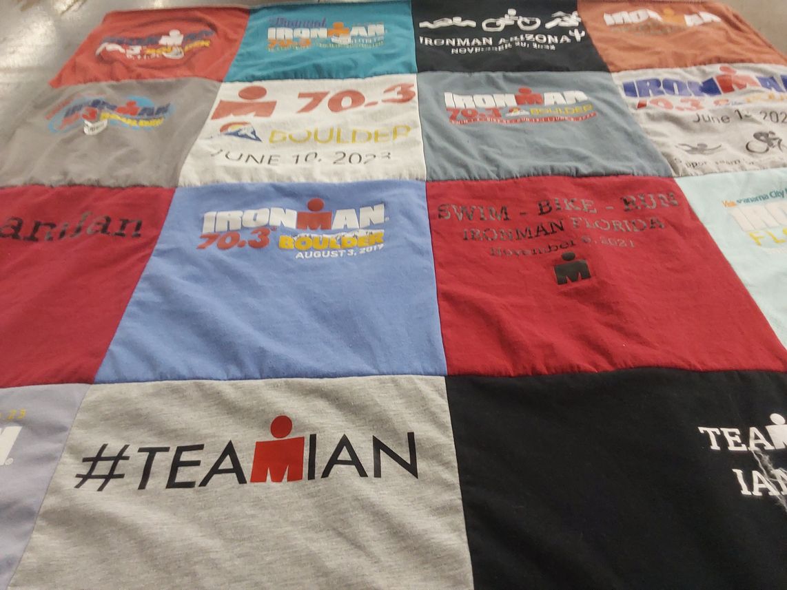 T-shirt quilt with triathlon, endurance sports themes by Carol from VA