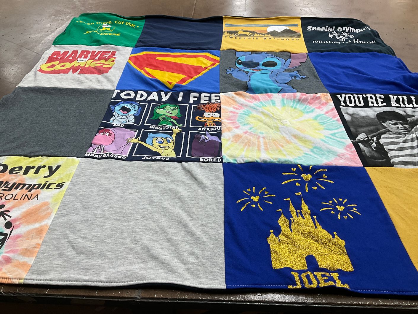 T-shirt quilt with disney, comic books themes by Alicia from NC