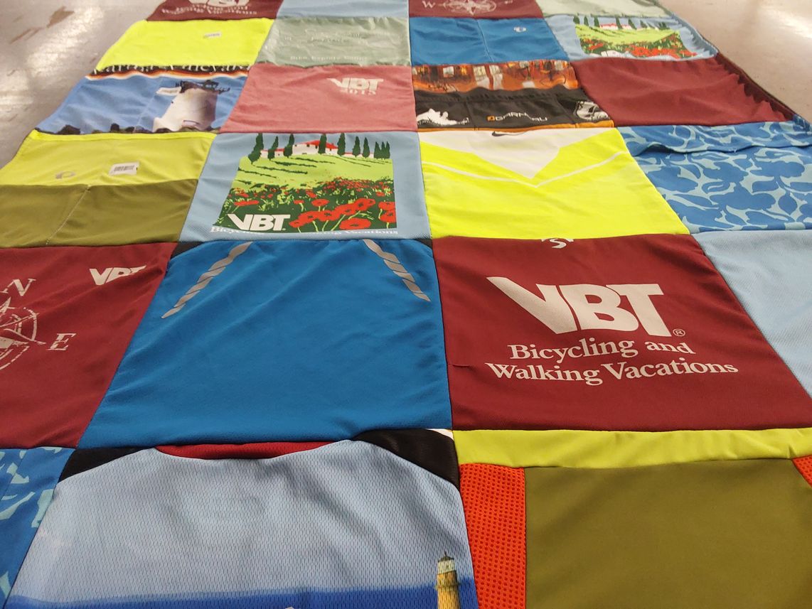 T-shirt quilt with bicycling, walking themes by Lisa from OH