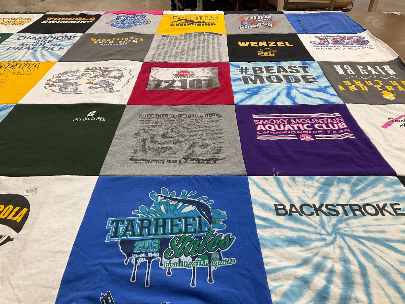 T-shirt quilt featuring smoky mountain aquatic club championship team by Georgiana from NC