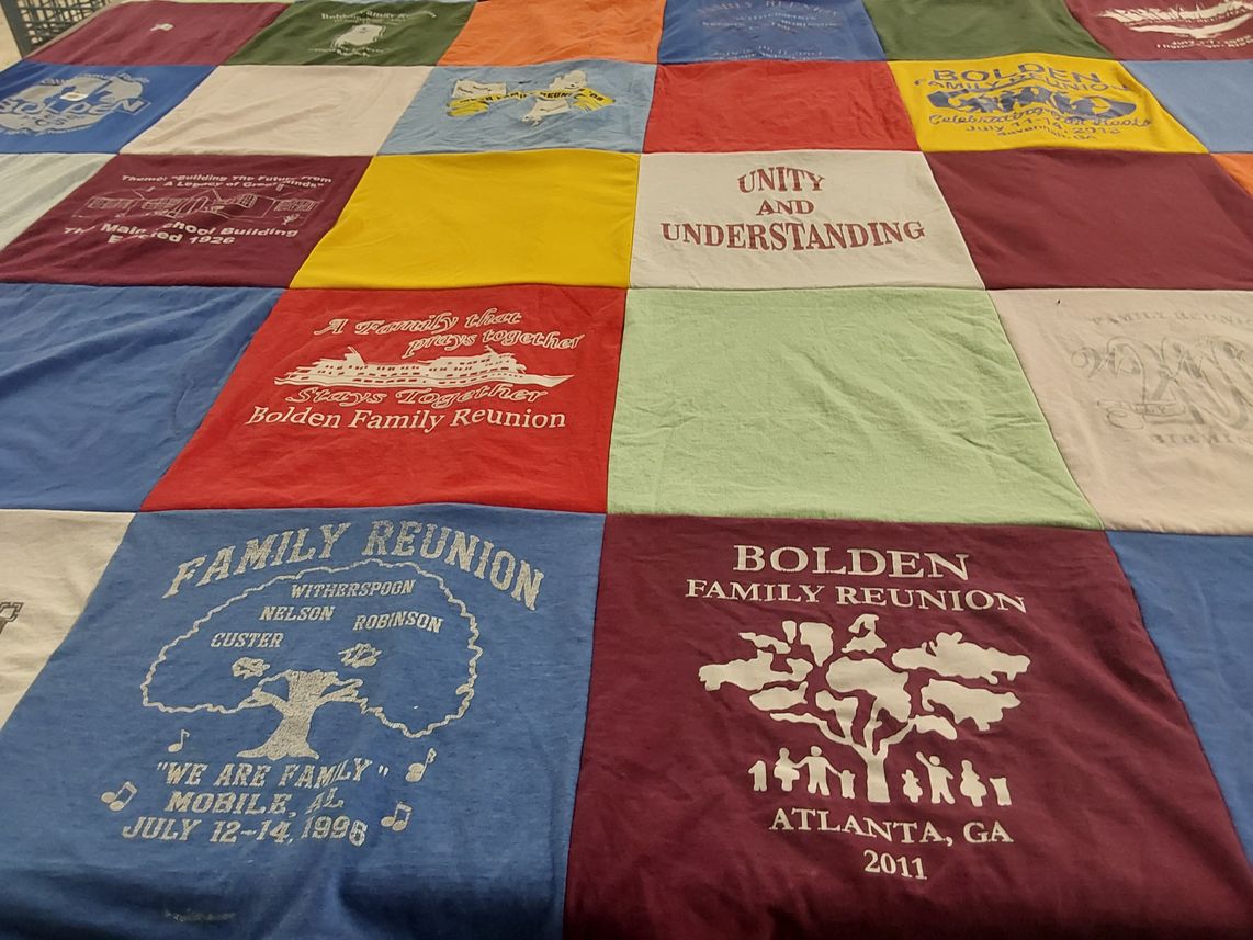 T-shirt quilt with family gatherings themes by Marilyn from AL
