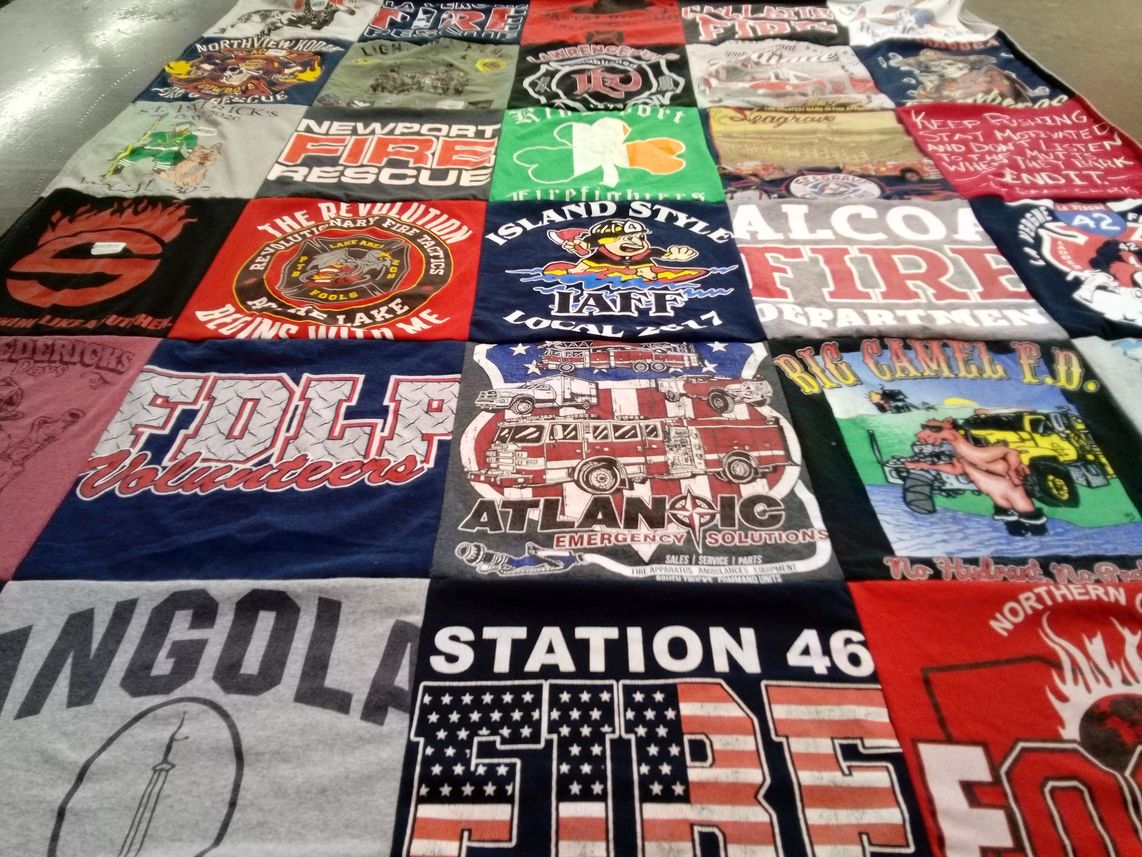 T-shirt quilt with firefighting, emergency services themes by Nichole from TN