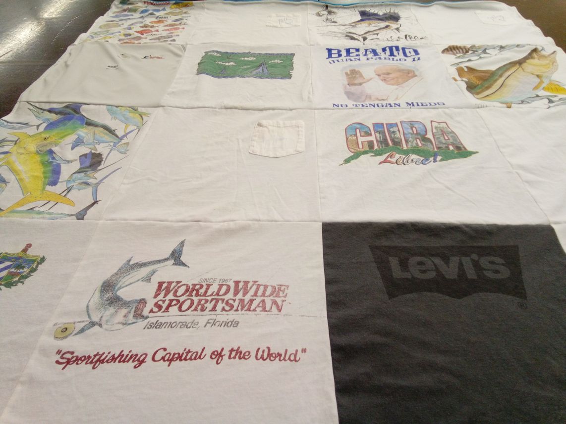 T-shirt quilt with fishing, travel themes by Jose from FL