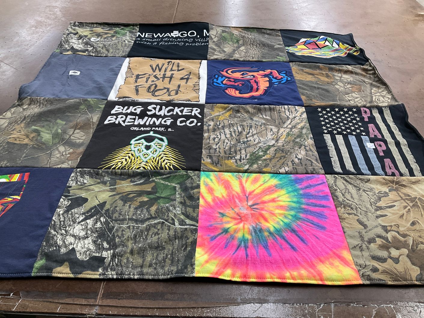 T-shirt quilt with fishing, brewing themes by Jean from MI