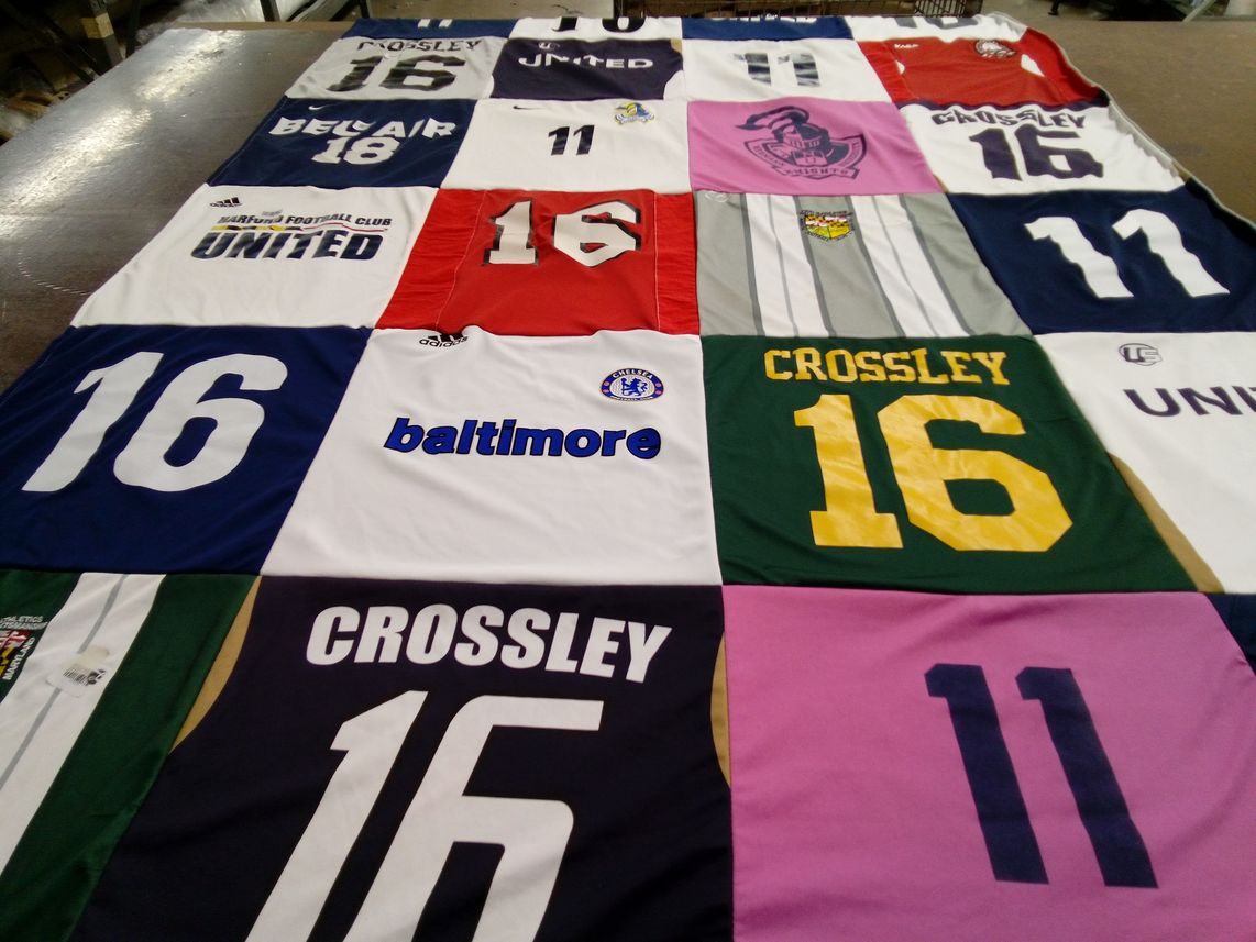 T-shirt quilt with soccer, football themes by Christina from MD