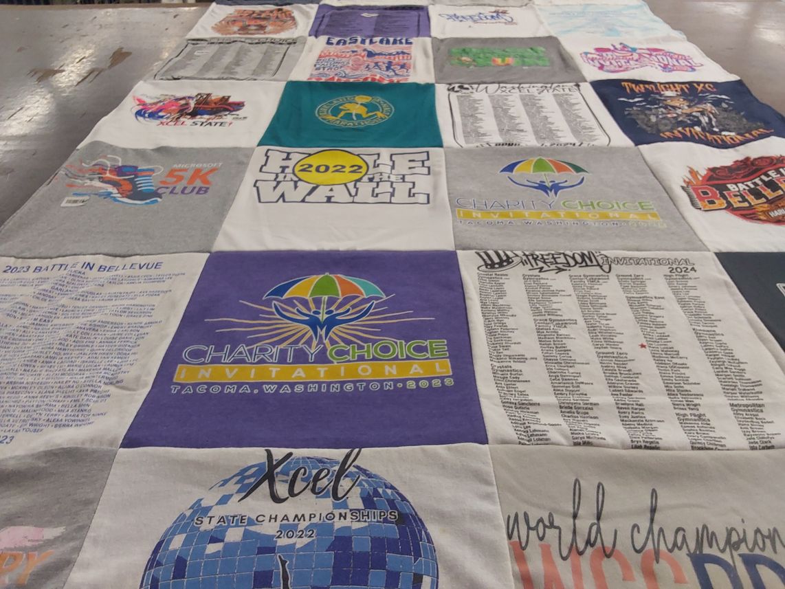T-shirt quilt with running, charity events themes by Elena from WA