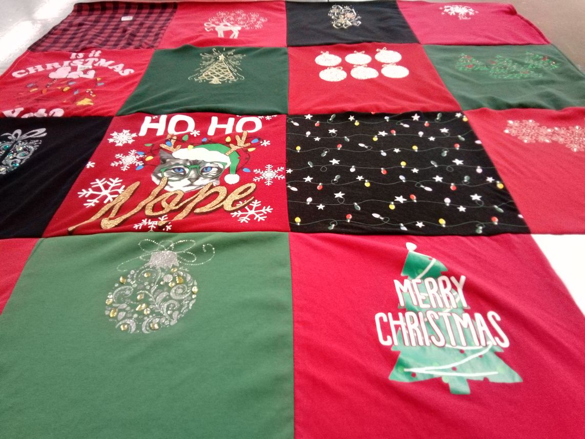 T-shirt quilt with christmas, holiday themes by Delores from IN