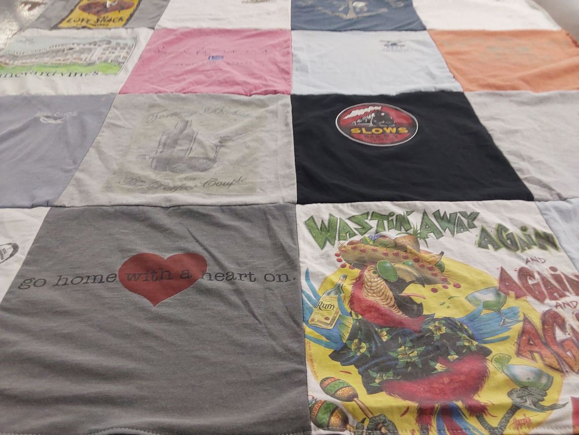 T-shirt quilt with cooking, music themes by Jamie from MI