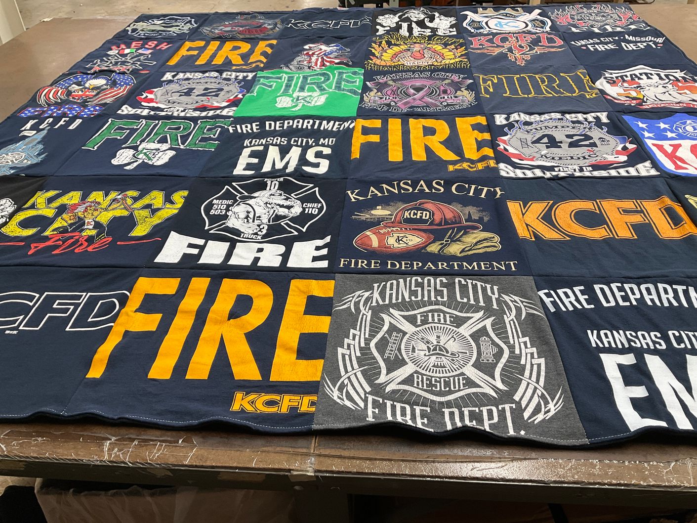 T-shirt quilt with firefighting, emergency services themes by James from MO