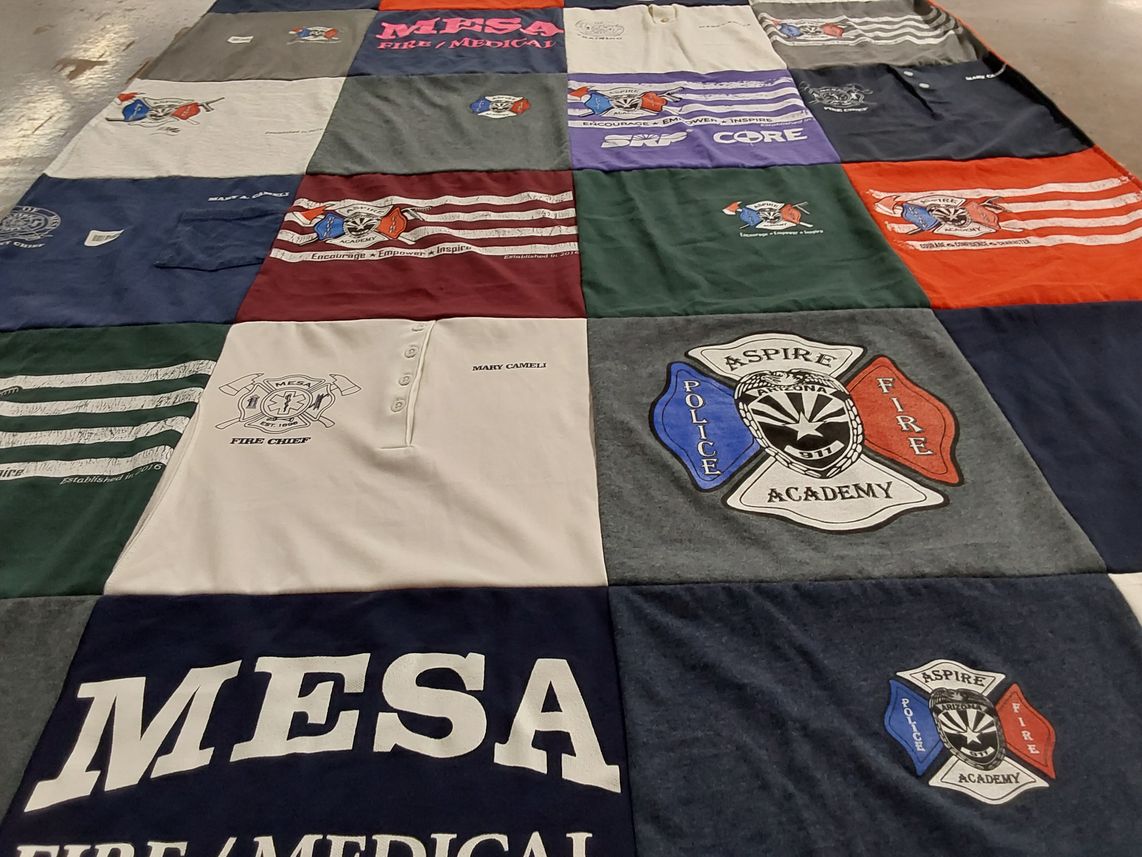 T-shirt quilt with firefighting, emergency services themes by jennifer from AZ