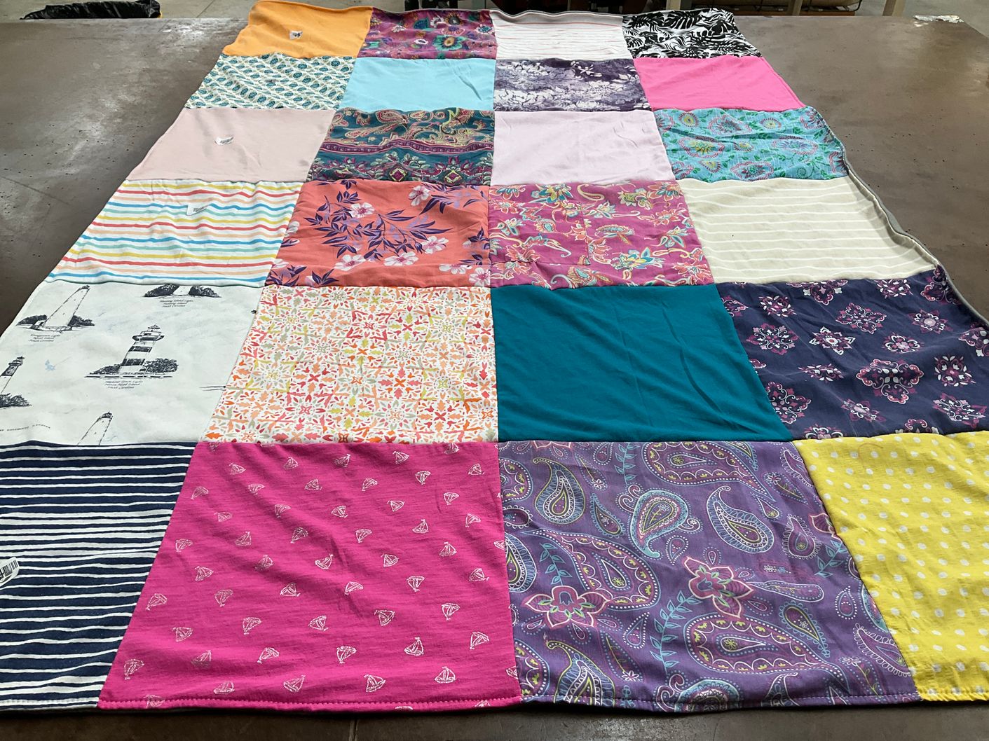 T-shirt quilt with floral patterns, nautical themes themes by Robin from WI