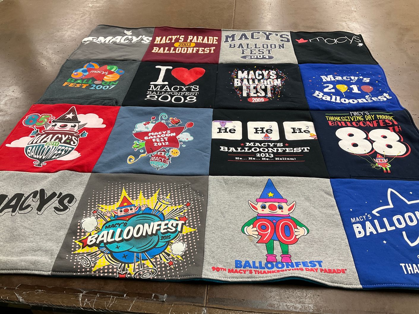 T-shirt quilt with festivals, parades themes by Wendi from NY