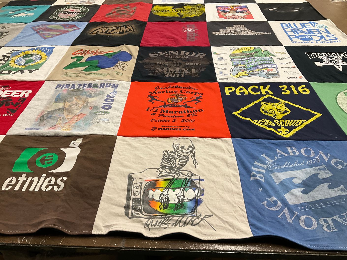 T-shirt quilt with running, scouting themes by Greta from FL