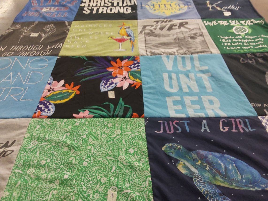 T-shirt quilt with volunteering, marine conservation themes by Katrina from SC