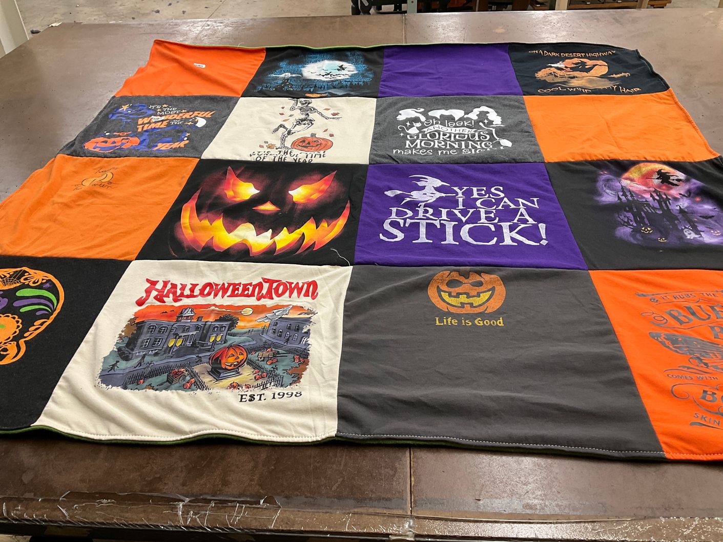 T-shirt quilt with halloween, celebration themes by Jane from MO