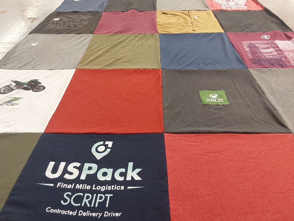 T-shirt quilt with gaming, motorcycles themes by Dawn from OH