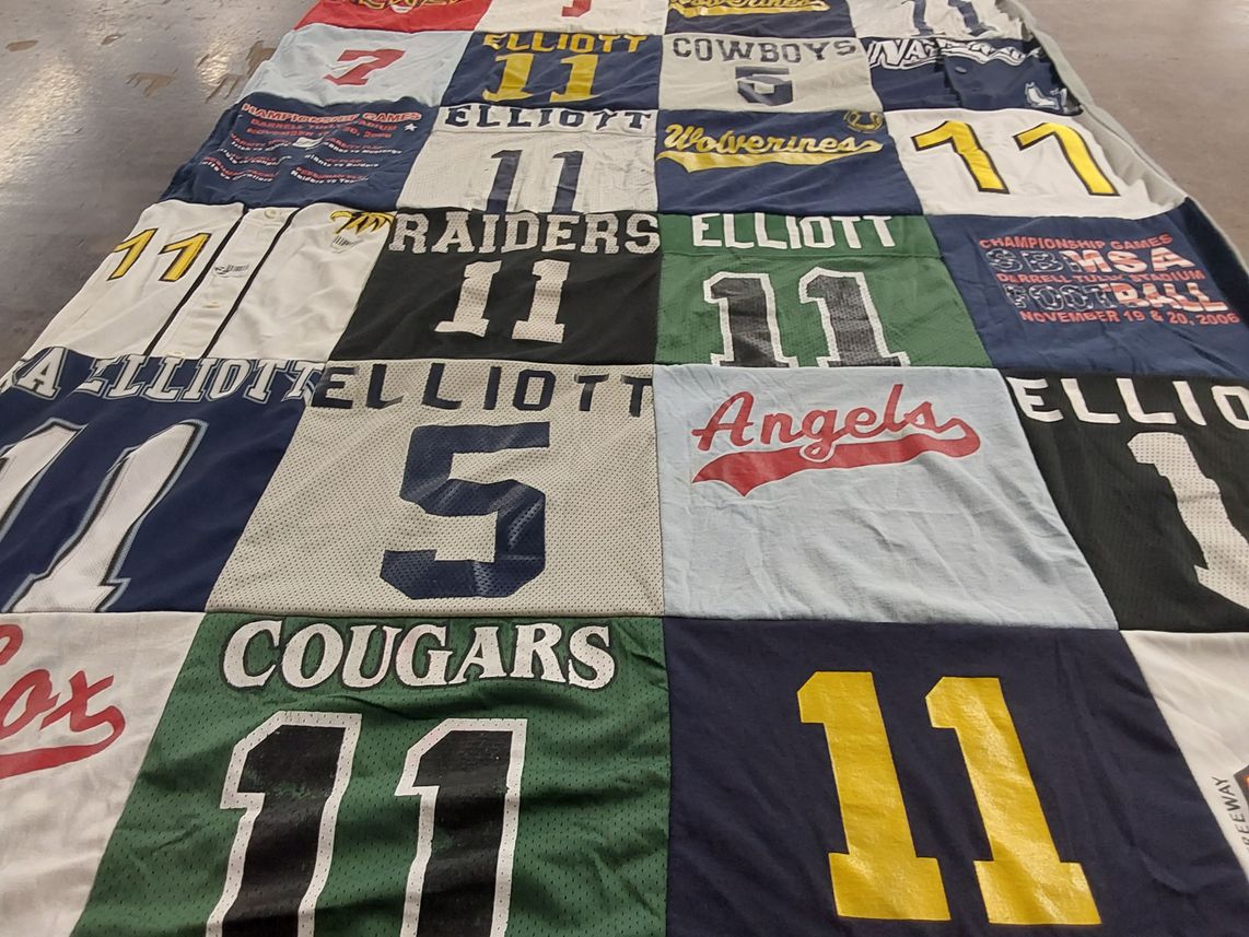 T-shirt quilt featuring cougars, raiders by Kelly from TX