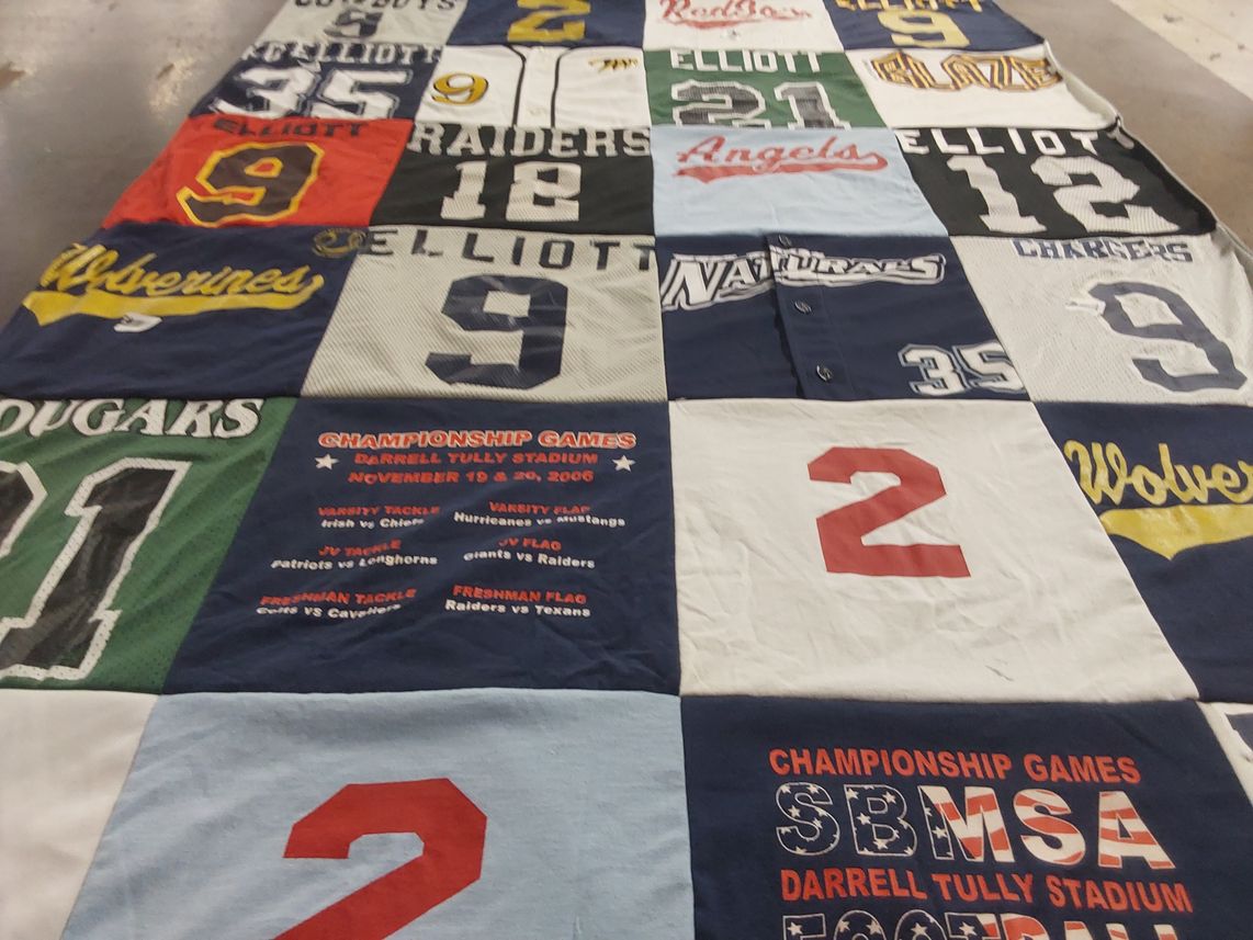 T-shirt quilt featuring raiders football team, patriots football team by Kelly from TX
