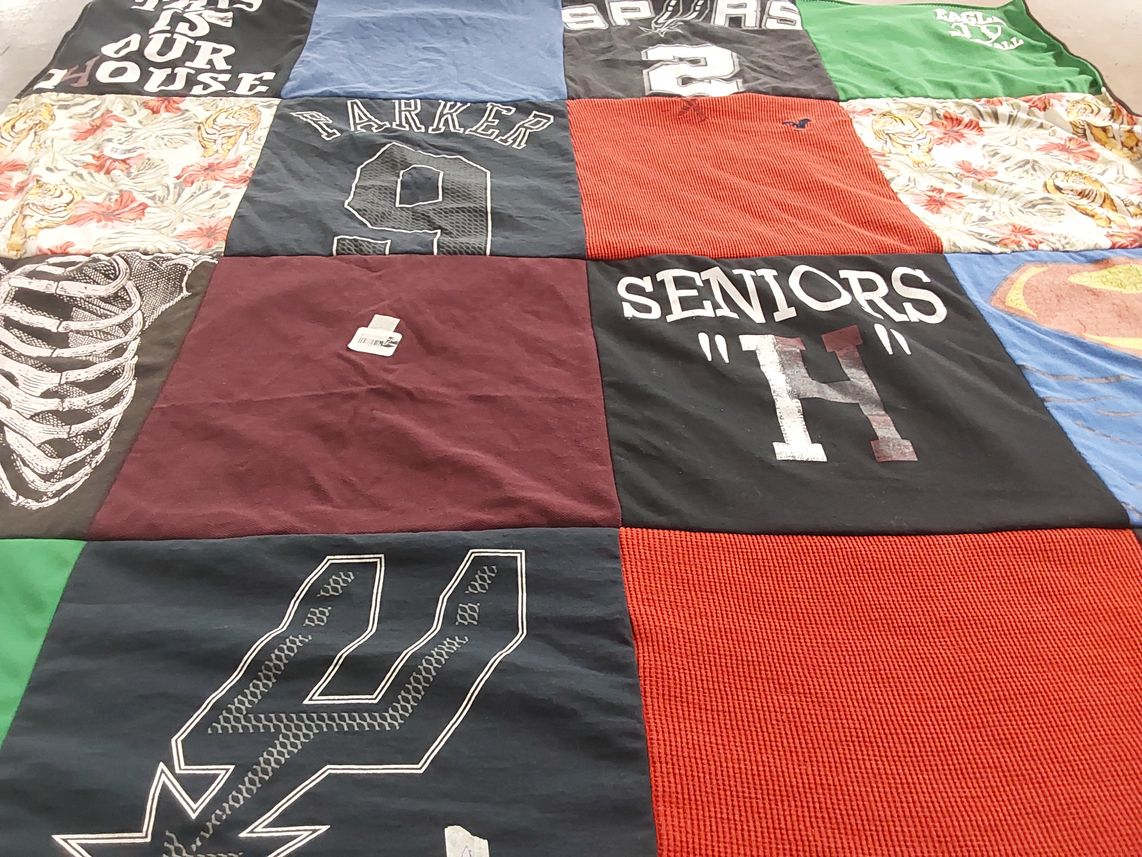 T-shirt quilt featuring spurs by Miranda from TX