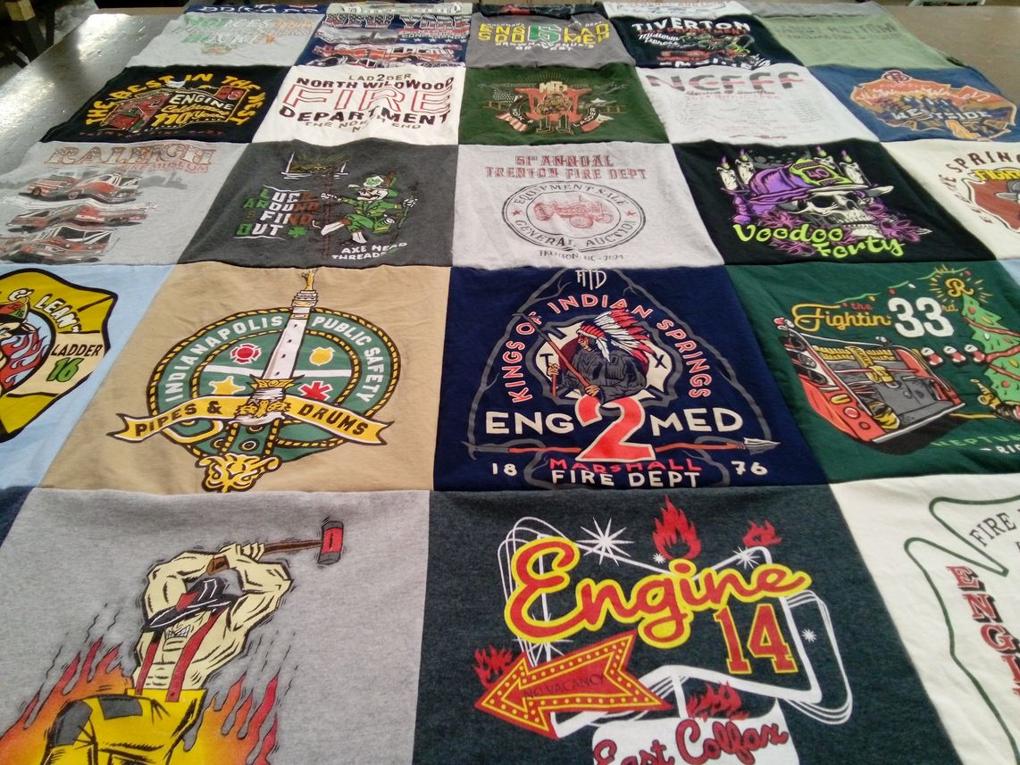 T-shirt quilt with firefighting, public safety themes by Amanda from NC