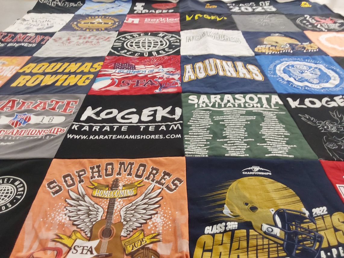 T-shirt quilt from st. thomas aquinas high school by Christina from FL