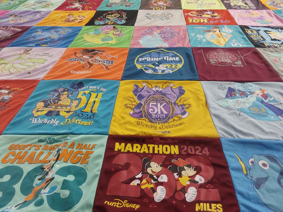 T-shirt quilt with running, disney themes by Rebecca from NY